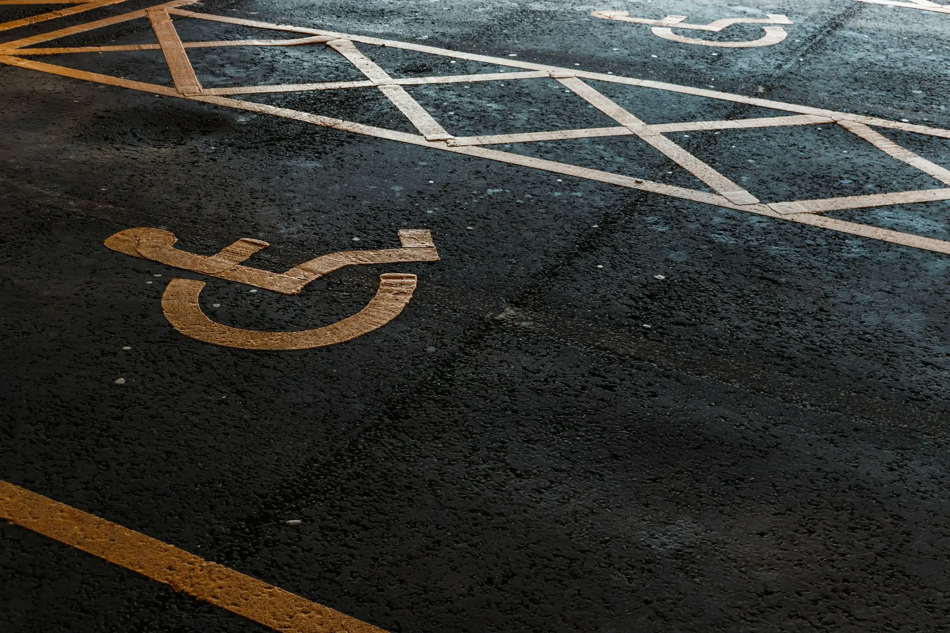 a parking space with a handicapped sign painted on it